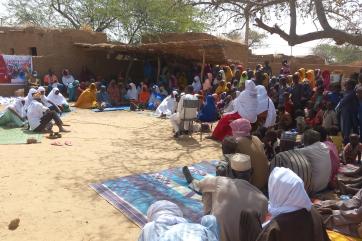 Community participating in program theater.